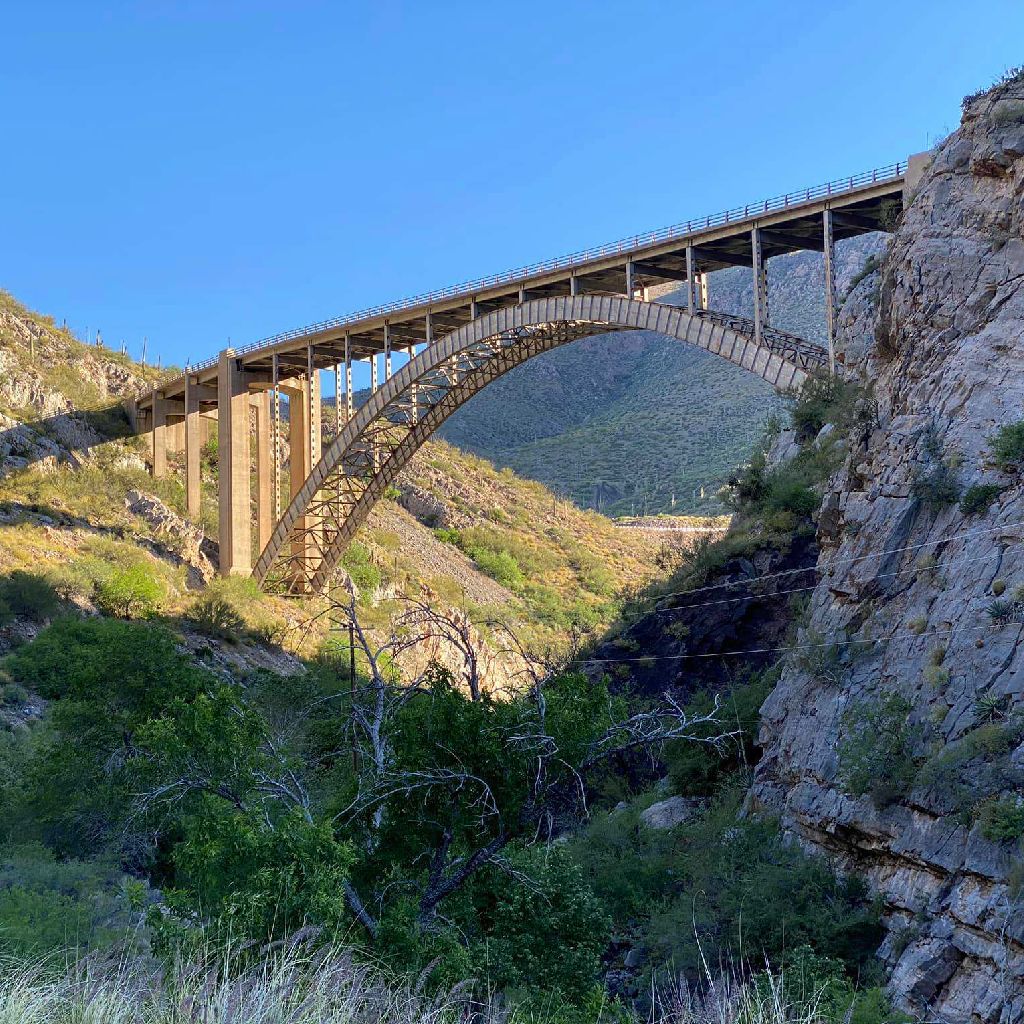A bridge in Superior, Arizona, spanning a majestic mountain canyon.